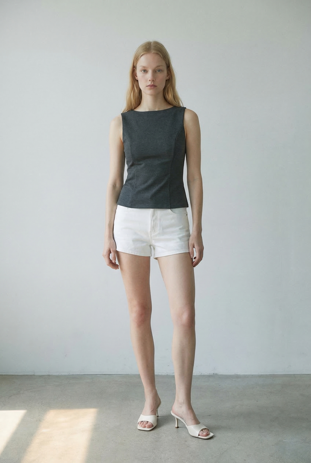 Stretch Knit Sleeveless Peplum Top